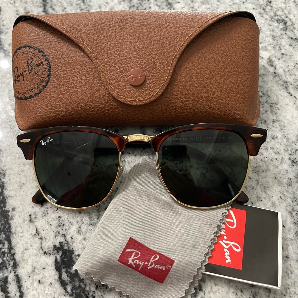 Ray-Ban tortoise shell sunglasses.